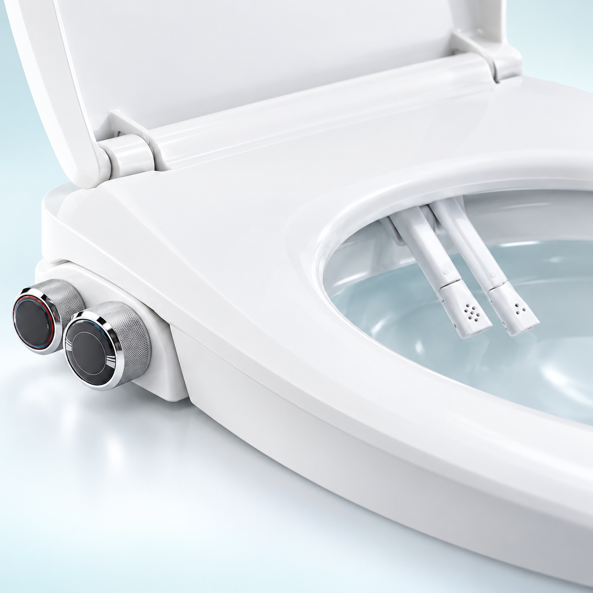 Manual bidet controls and integrated nozzles